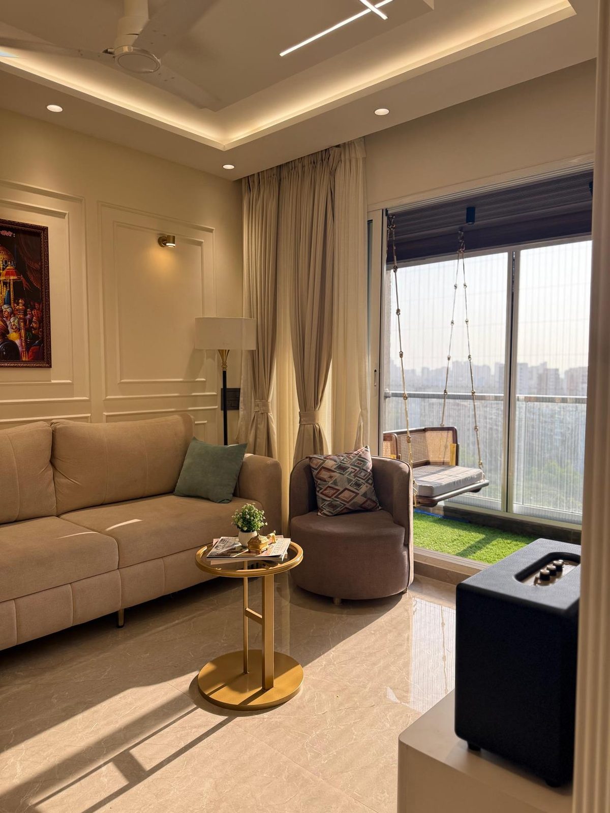 Interior design project by the best interior designers in Navi Mumbai — a warm, panelled living room with balcony view by Urbanwall.
